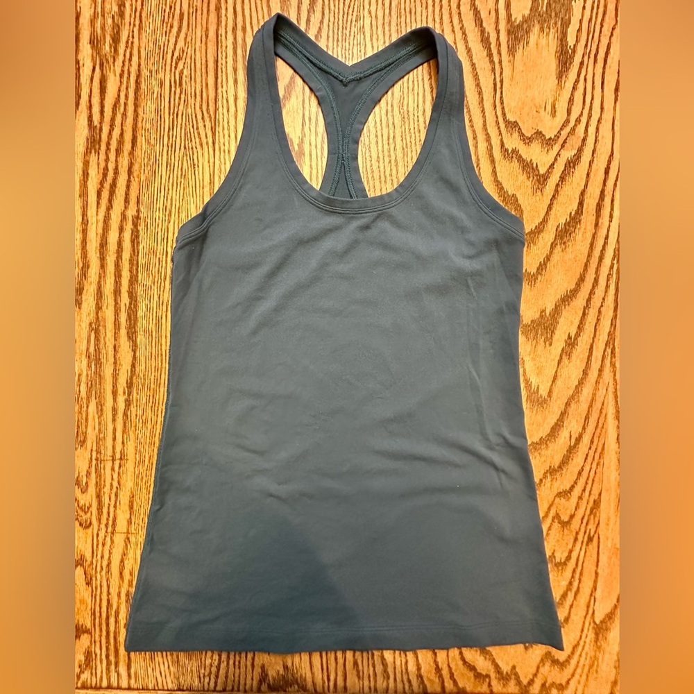 Lululemon Teal Racerback Tank no tag with size fits like a small S